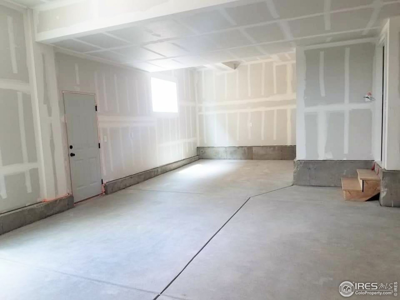 2137 Day Spring Drive Windsor, CO 80550 - Photo 26 of 39 an empty room with windows