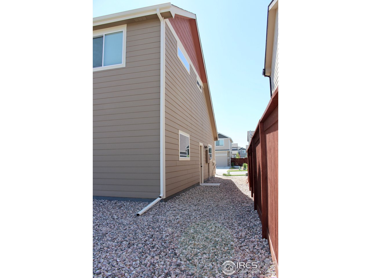 2137 Day Spring Drive Windsor, CO 80550 - Photo 32 of 39 a view of a house with a backyard