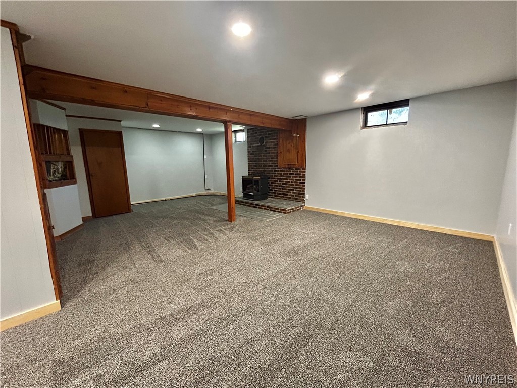 3564 Roszyk Hill Road Machias, NY 14101 - Photo 13 of 20 An open basement area features comfortable carpeti