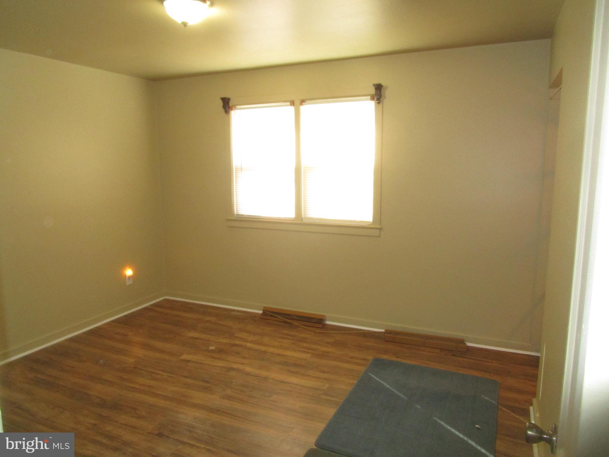2816 Keating Street, Unit 164 Temple Hills, MD 20748 - Photo 7 of 25 an empty room with a window