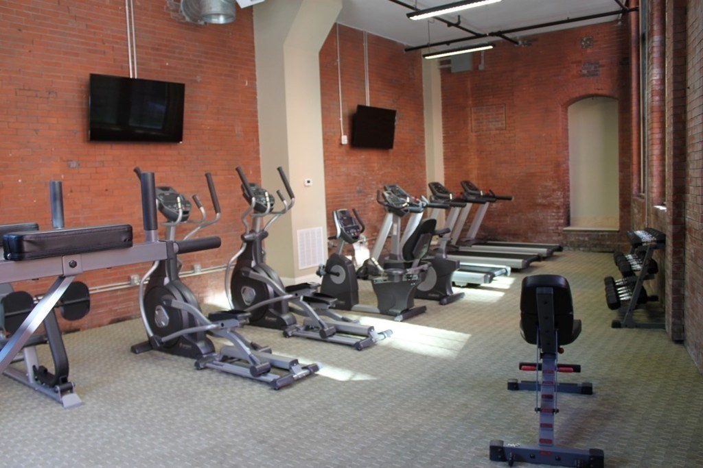 64 Beacon Street, Unit A307 Worcester, MA 01608 - Photo 18 of 23 a view of a room with gym equipment