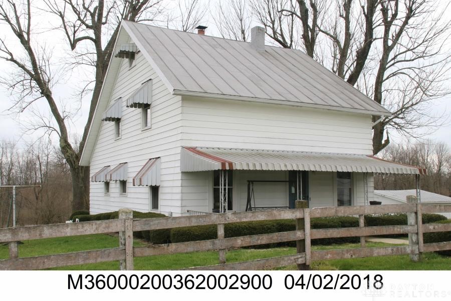 1359 East Hoop Road Xenia, OH 45385 - Photo 1 of 1 This charming residence features classic siding and a metal roof, offering timeless appeal.