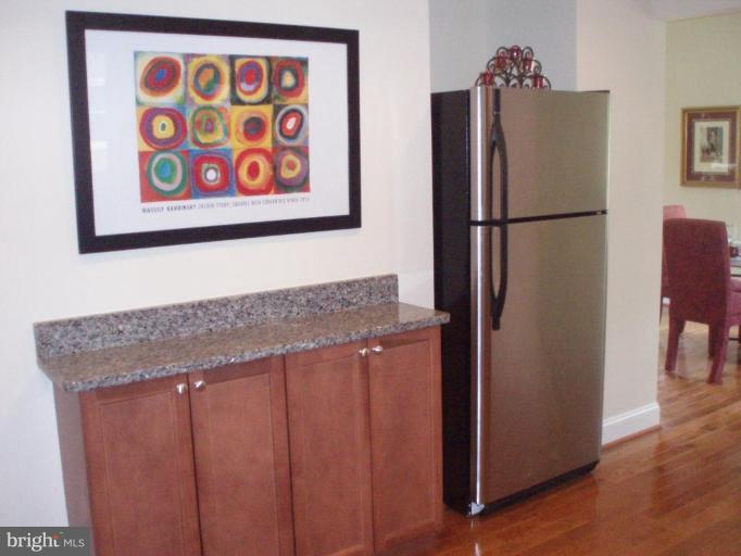 900 Laredo Road Silver Spring, MD 20901 - Photo 5 of 10 a kitchen with stainless steel appliances granite countertop a refrigerator and a sink
