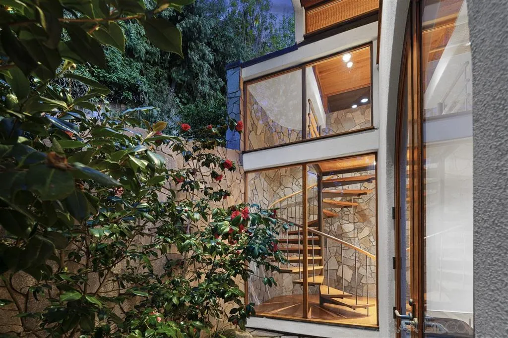 7510 Hillside Drive La Jolla, CA 92037 - Photo 14 of 25 a view of a door and wooden floor