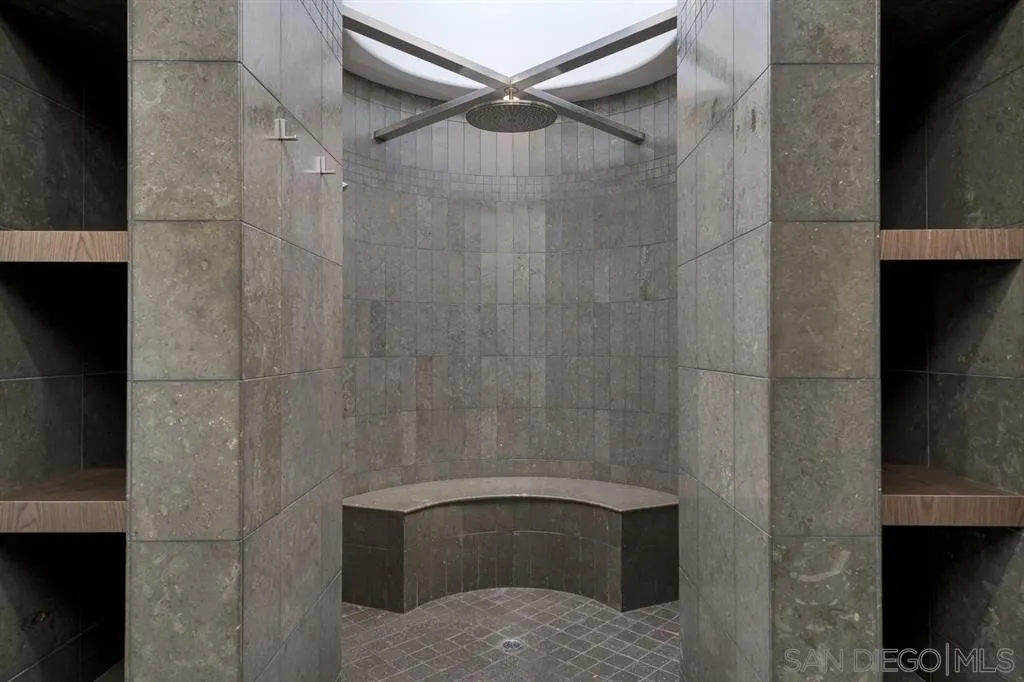 7510 Hillside Drive La Jolla, CA 92037 - Photo 20 of 25 a bathroom with a shower and a sink