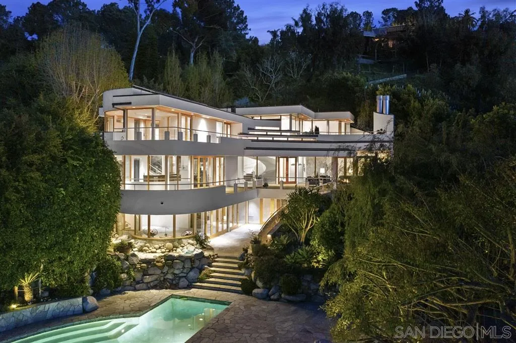 7510 Hillside Drive La Jolla, CA 92037 - Photo 2 of 25 a front view of a house with a yard