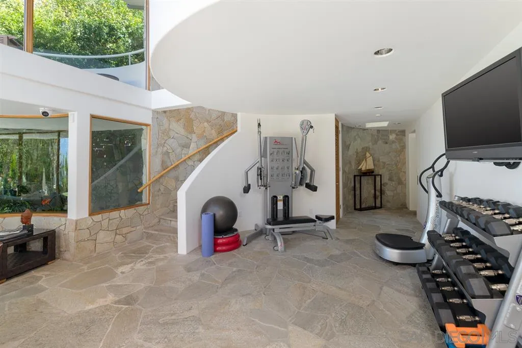 7510 Hillside Drive La Jolla, CA 92037 - Photo 21 of 25 a view of a room with gym equipment