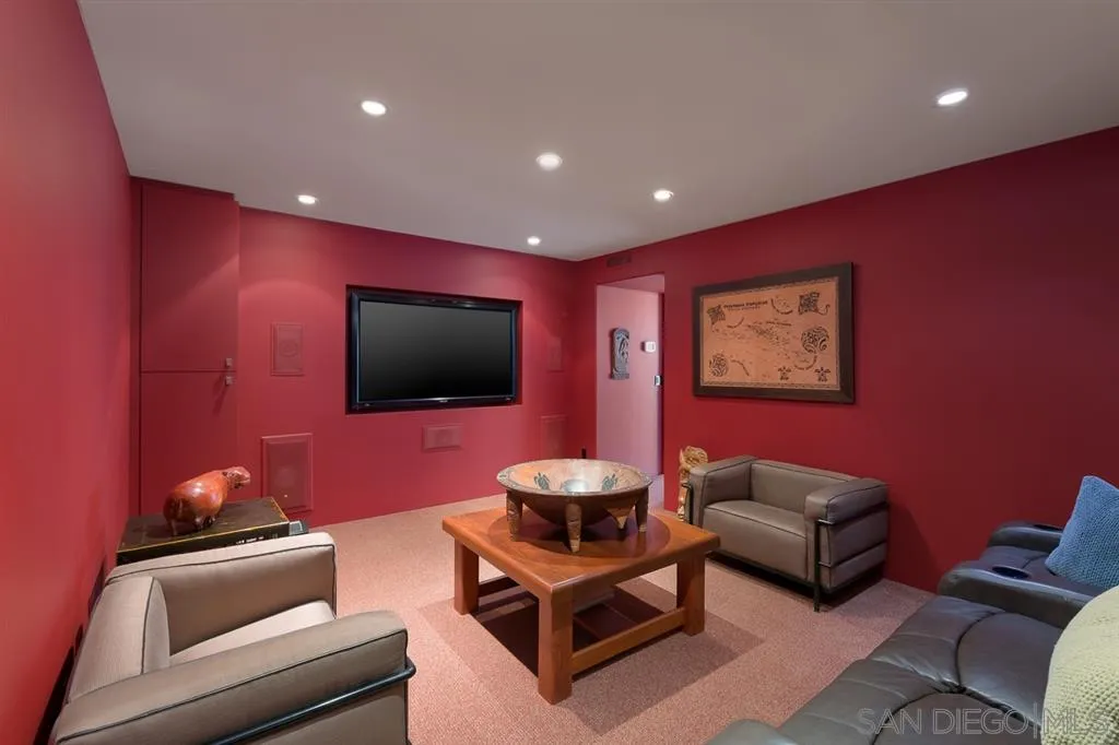 7510 Hillside Drive La Jolla, CA 92037 - Photo 24 of 25 a living room with furniture and a flat screen tv