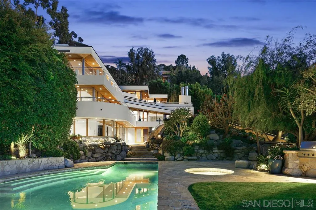 7510 Hillside Drive La Jolla, CA 92037 - Photo 4 of 25 a front view of a house with a yard