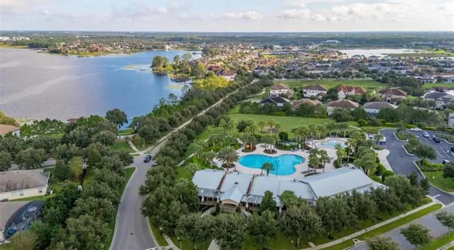 a view of a garden with large trees