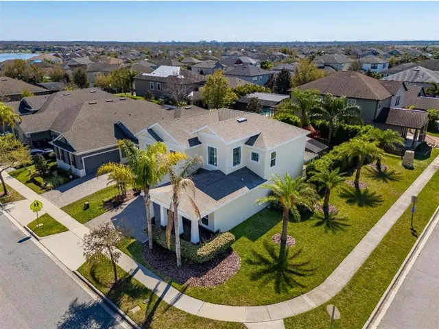 an aerial view of a house with a garden