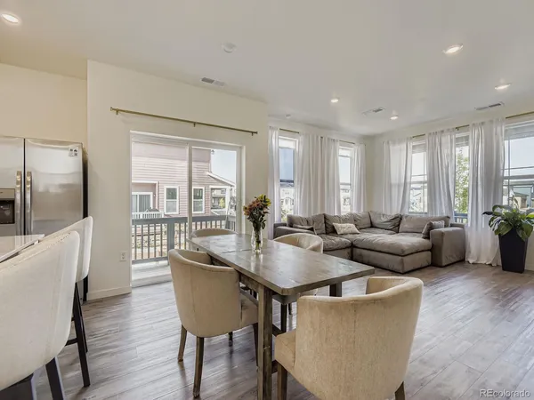 a living room with furniture and a table