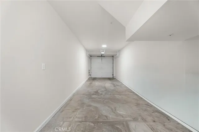 an aerial view of a house with a lake view