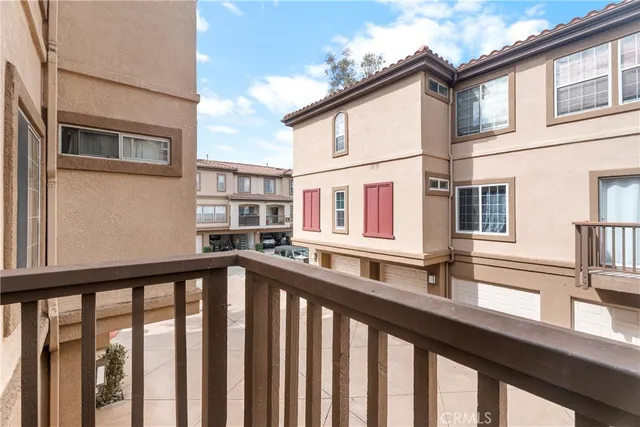 a view of a street from a balcony