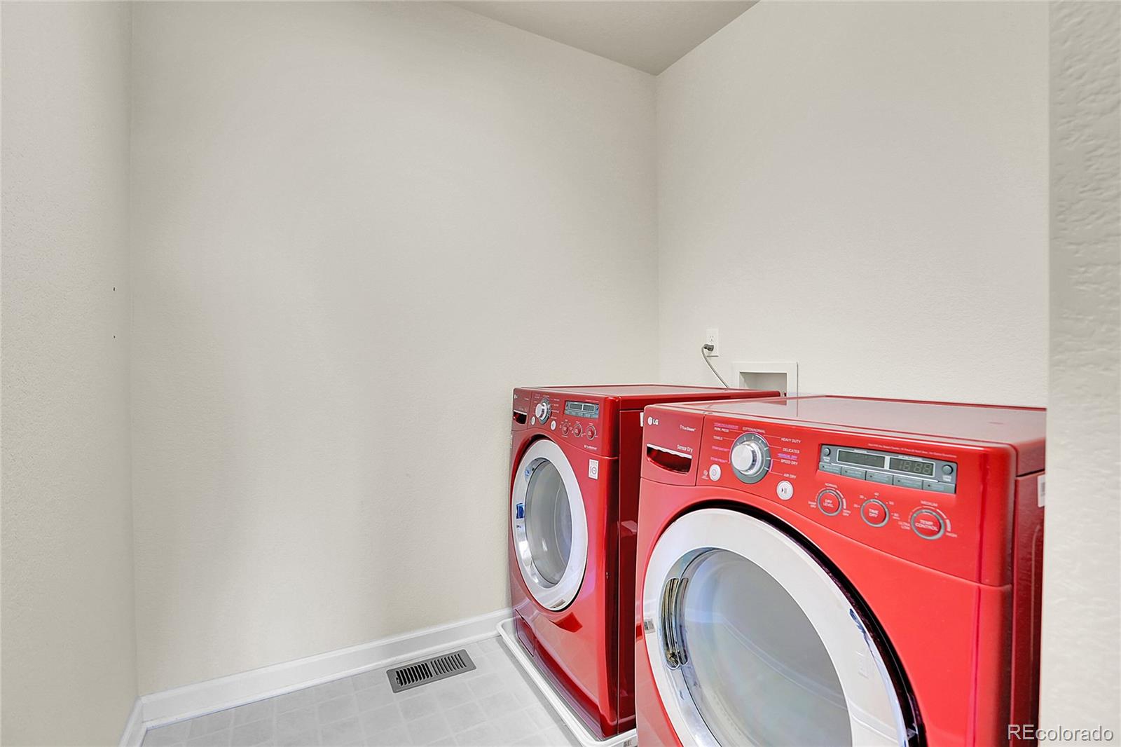 3310 Quicksilver Road Frederick, CO 80516 - Photo 23 of 35 a utility room with dryer and washer