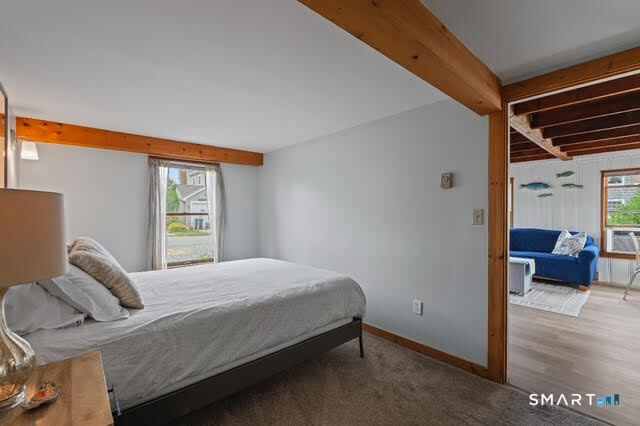 42 Noble Avenue Groton, CT 06340 - Photo 7 of 9 a bedroom with a bed and a window