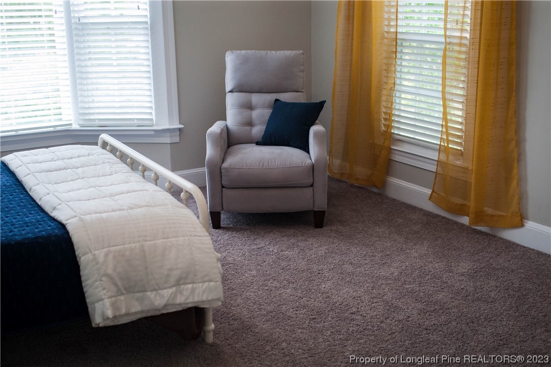 1807 Morganton Road Fayetteville, NC 28305 - Photo 24 of 37 a living room with furniture and a window