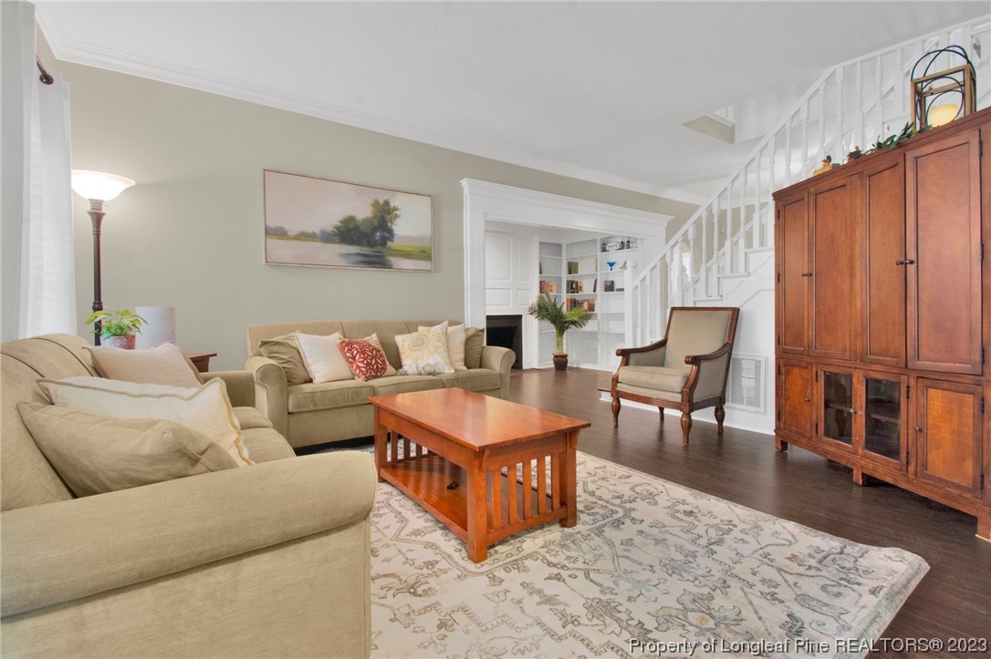 1807 Morganton Road Fayetteville, NC 28305 - Photo 4 of 37 a living room with furniture wooden floor and window