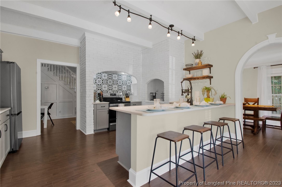 1807 Morganton Road Fayetteville, NC 28305 - Photo 8 of 37 a kitchen with a table and chairs in it