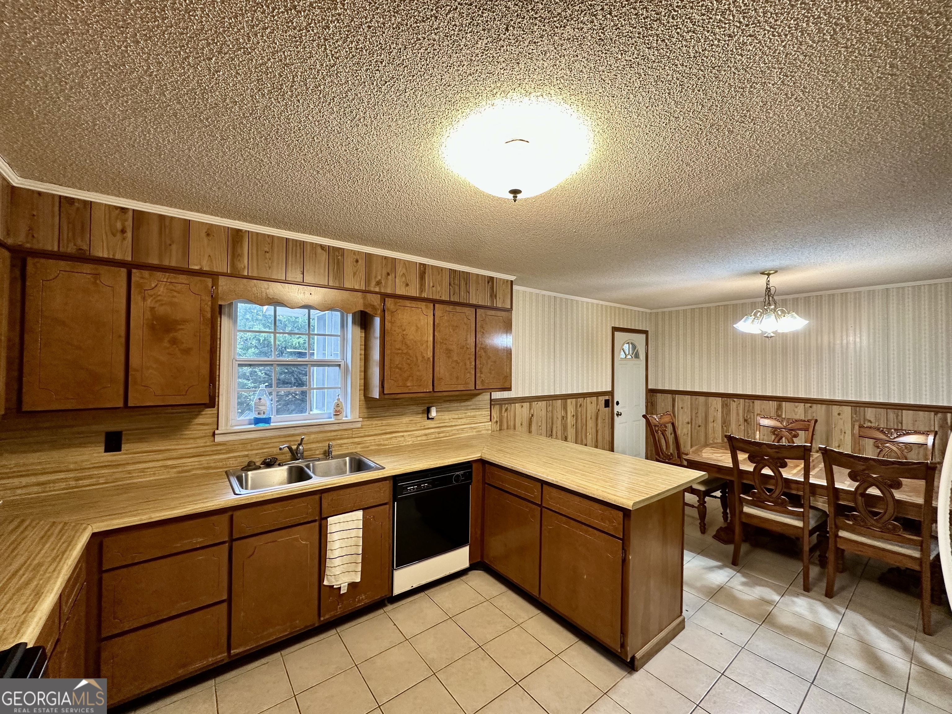 74 Community Church Road McRae-Helena, GA 31037 - Photo 11 of 24 a large kitchen with a large window and counter space