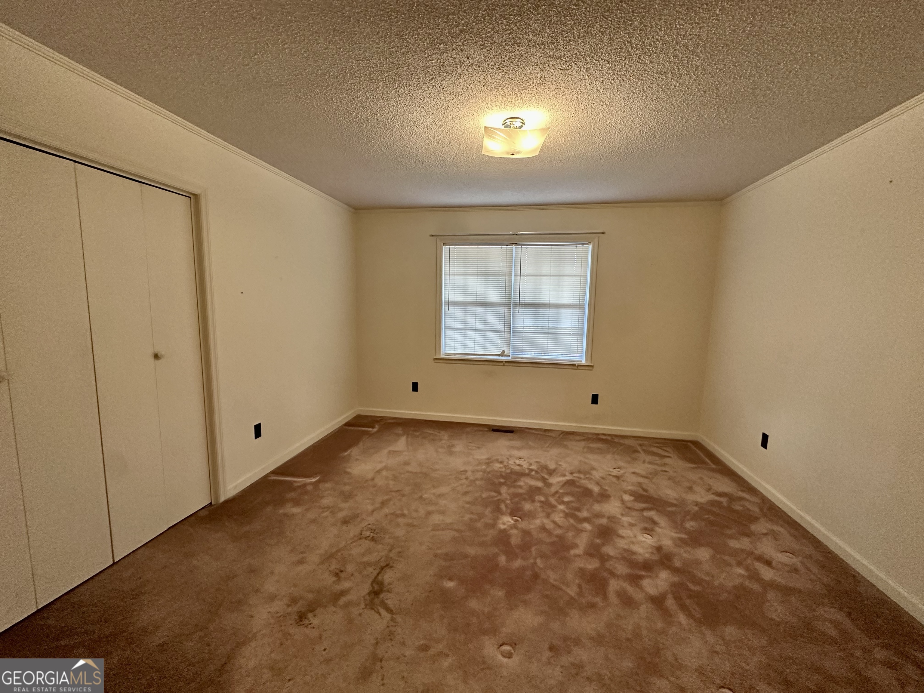 74 Community Church Road McRae-Helena, GA 31037 - Photo 16 of 24 a view of an empty room with a window