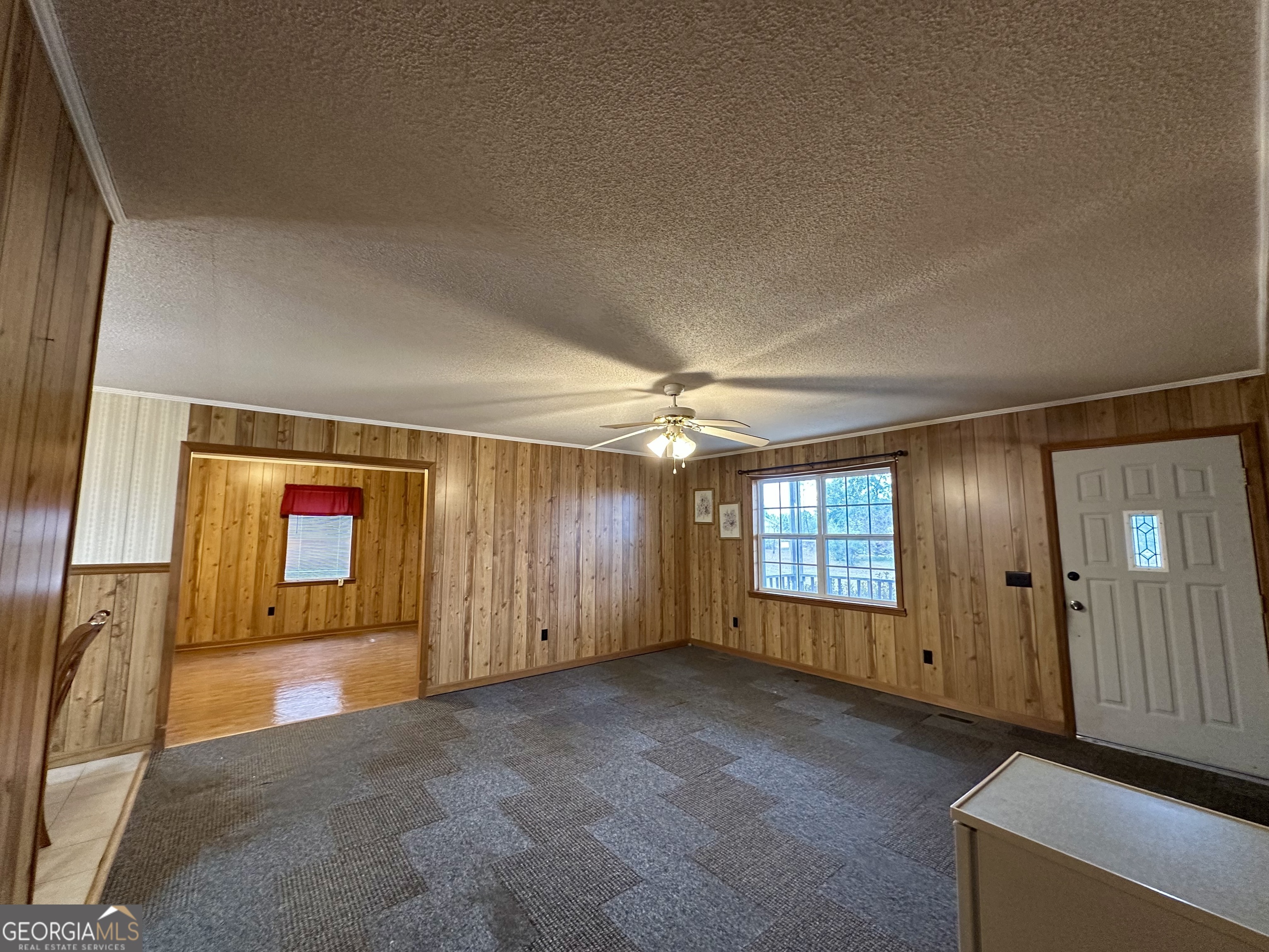 74 Community Church Road McRae-Helena, GA 31037 - Photo 3 of 24 a view of a livingroom with a chandelier
