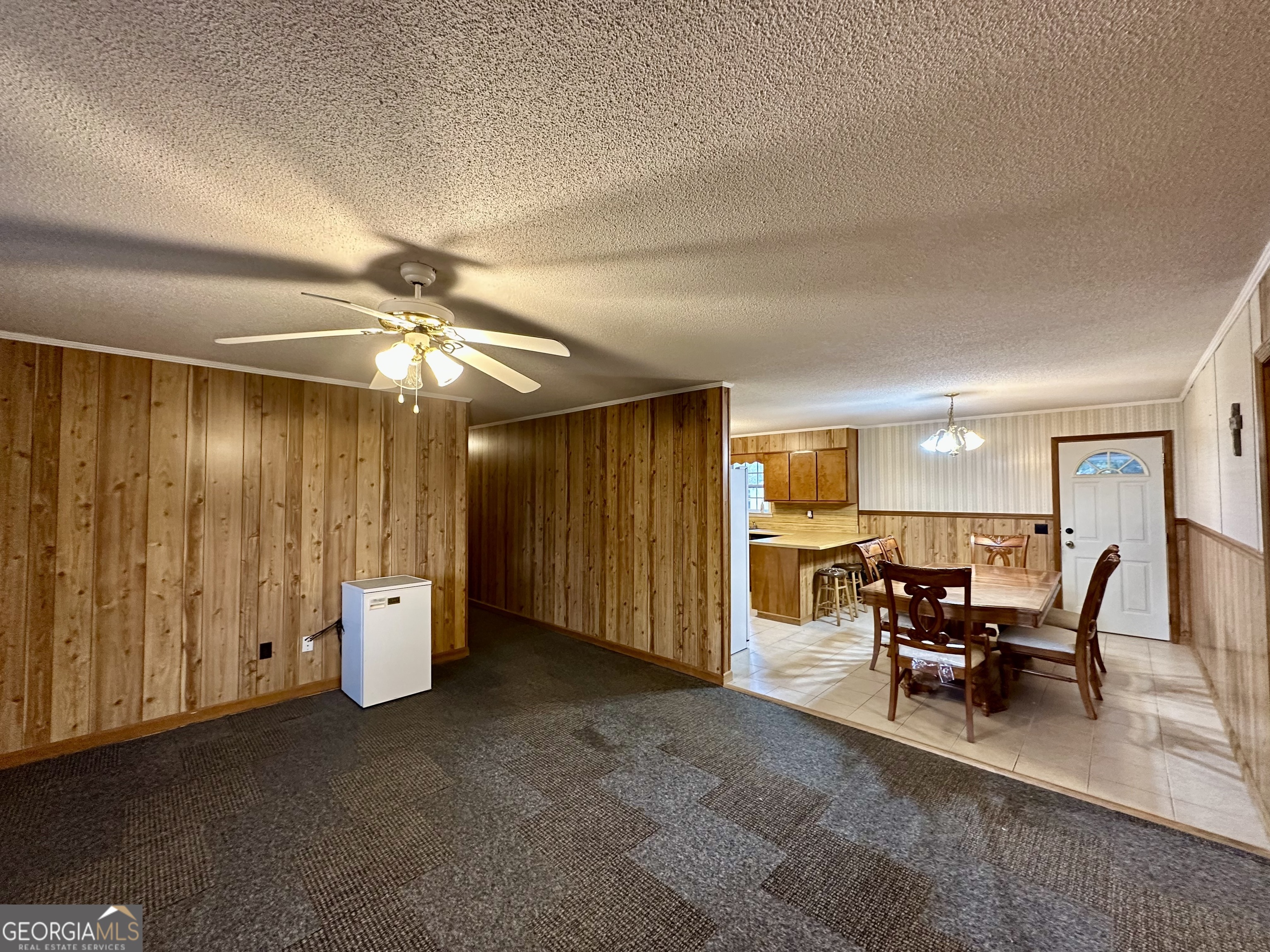 74 Community Church Road McRae-Helena, GA 31037 - Photo 9 of 24 a view of a livingroom with furniture and chandelier