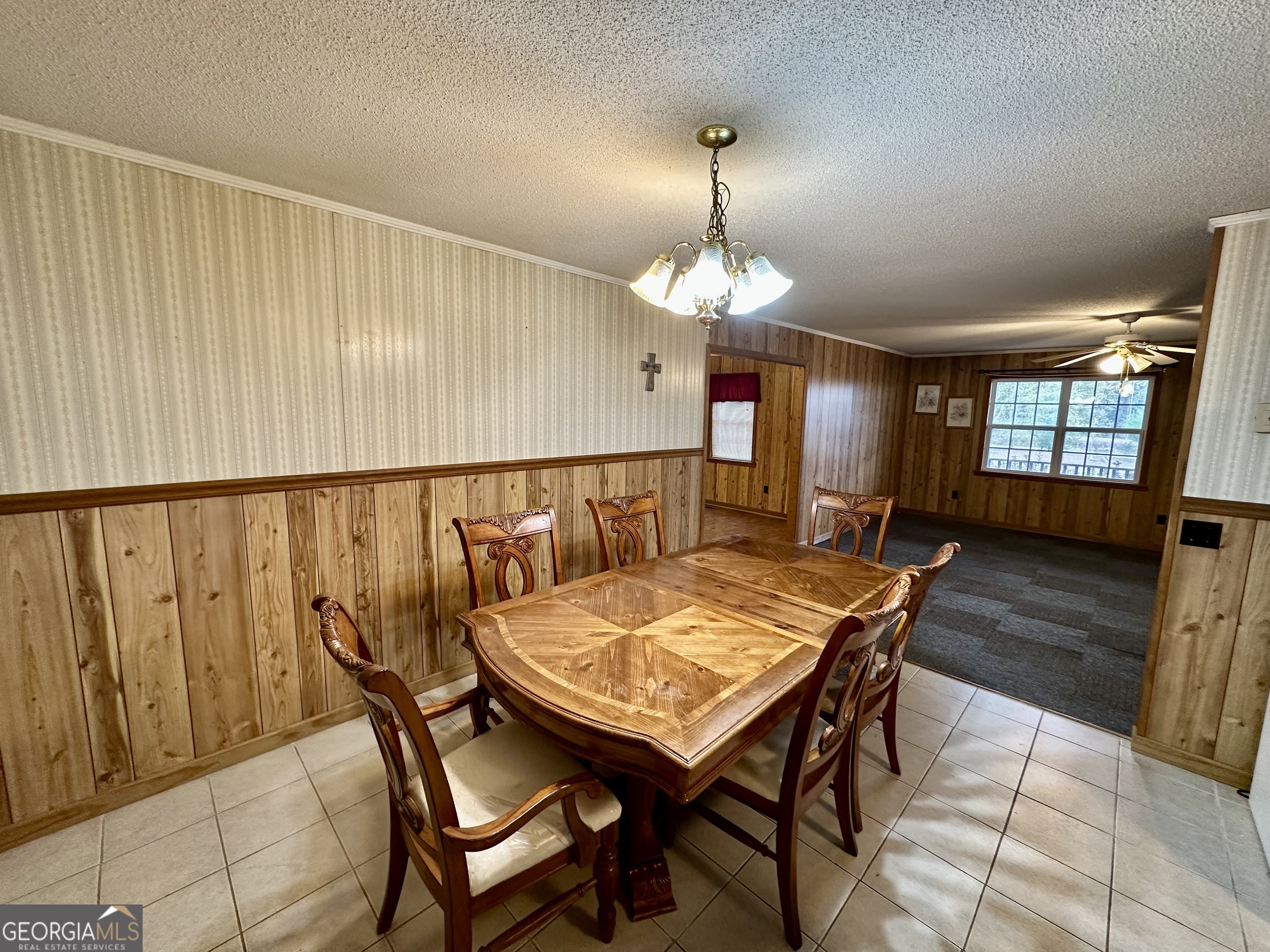 74 Community Church Road McRae-Helena, GA 31037 - Photo 10 of 24 a view of a dining room with furniture and wooden floor