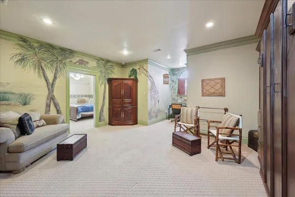 a living room with furniture and a table