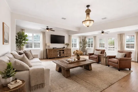 a kitchen with stainless steel appliances a refrigerator sink and stove