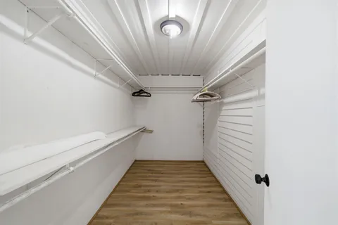 an aerial view of a house with a garden