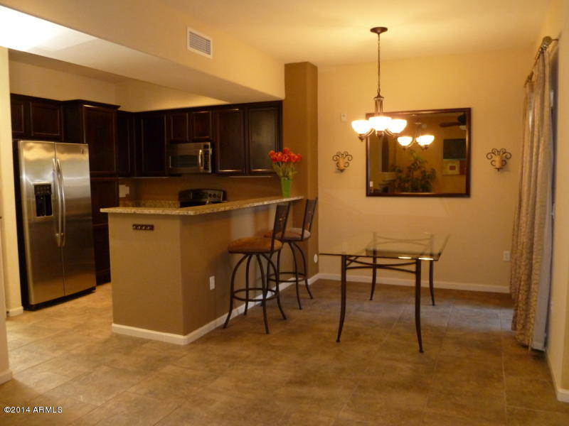 3935 East Rough Rider Road, Unit 1149 Phoenix, AZ 85050 - Photo 11 of 27 View from living room