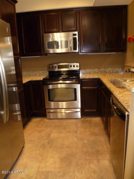 3935 East Rough Rider Road, Unit 1149 Phoenix, AZ 85050 - Photo 15 of 27 kitchen nook