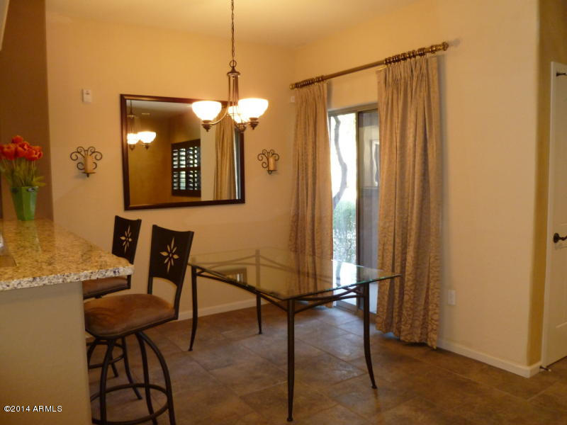 3935 East Rough Rider Road, Unit 1149 Phoenix, AZ 85050 - Photo 20 of 27 Dining area