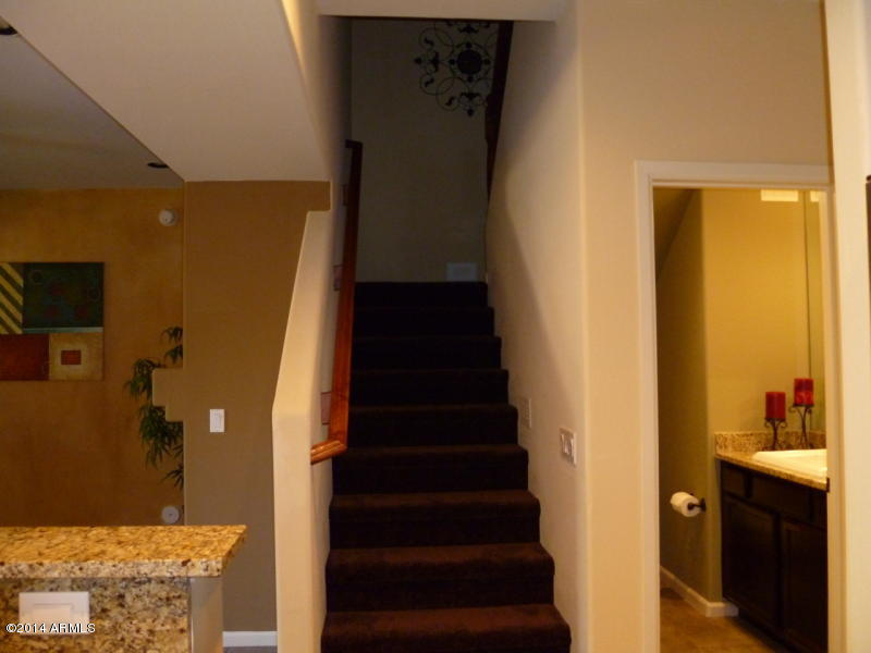 3935 East Rough Rider Road, Unit 1149 Phoenix, AZ 85050 - Photo 25 of 27 Stairway leading up.