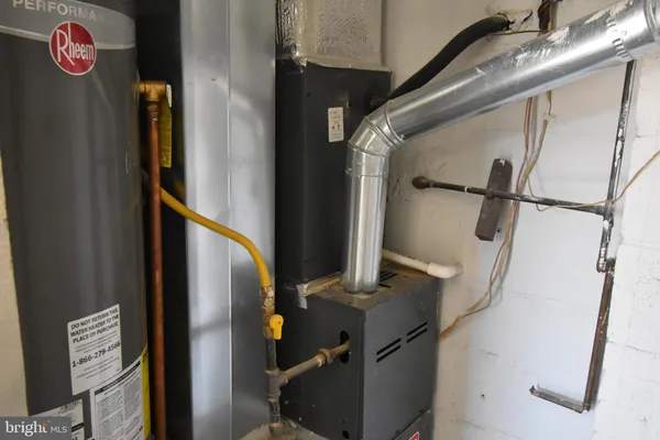 a bathroom with a mirror and a shower