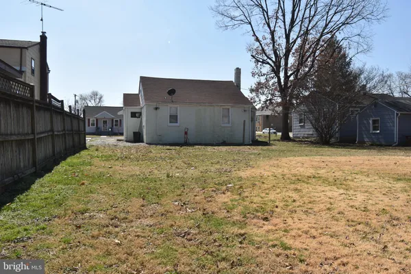 a house with a large tree in front of it