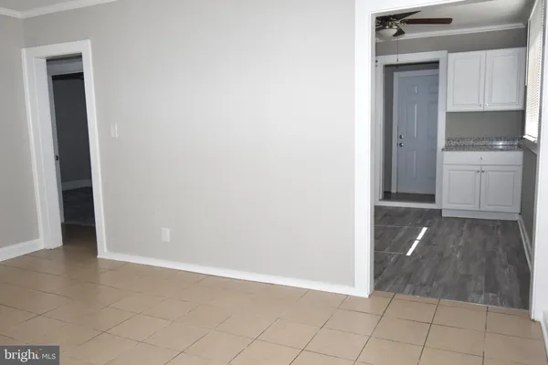 a view of a utility room with closet