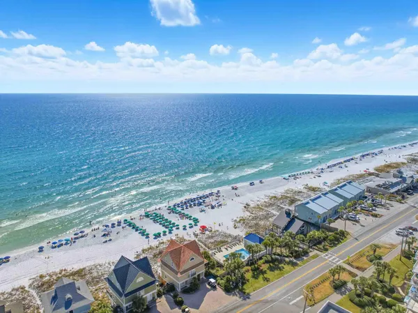 an aerial view of beach and ocean
