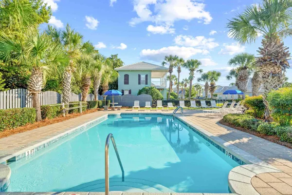 a view of a swimming pool with a patio
