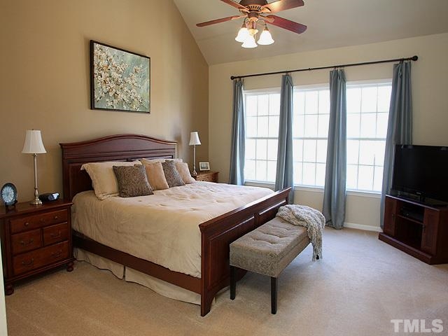 1806 Patterson Grove Road Apex, NC 27502 - Photo 11 of 25 The master bedroom suite has a vaulted ceiling, abundant lighting, and FOUR closets. A seating area in the master faces the front of the home.