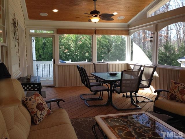 1806 Patterson Grove Road Apex, NC 27502 - Photo 20 of 25 Added in 2014, no detail was spared on this amazing space! Tongue and groove plank vaulted ceiling, audio, wainscoting, and privacy blinds.
