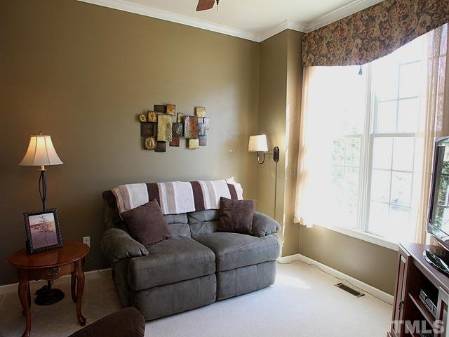 1806 Patterson Grove Road Apex, NC 27502 - Photo 5 of 25 The living room to the right of the foyer would make a nice office as well, it also has doors which are removable.