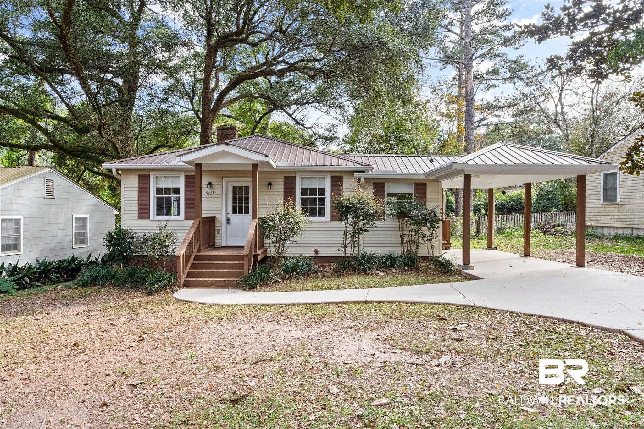 5113 Norton Lane Mobile, AL 36608 - Photo 1 of 20 View of front of property with a carport
