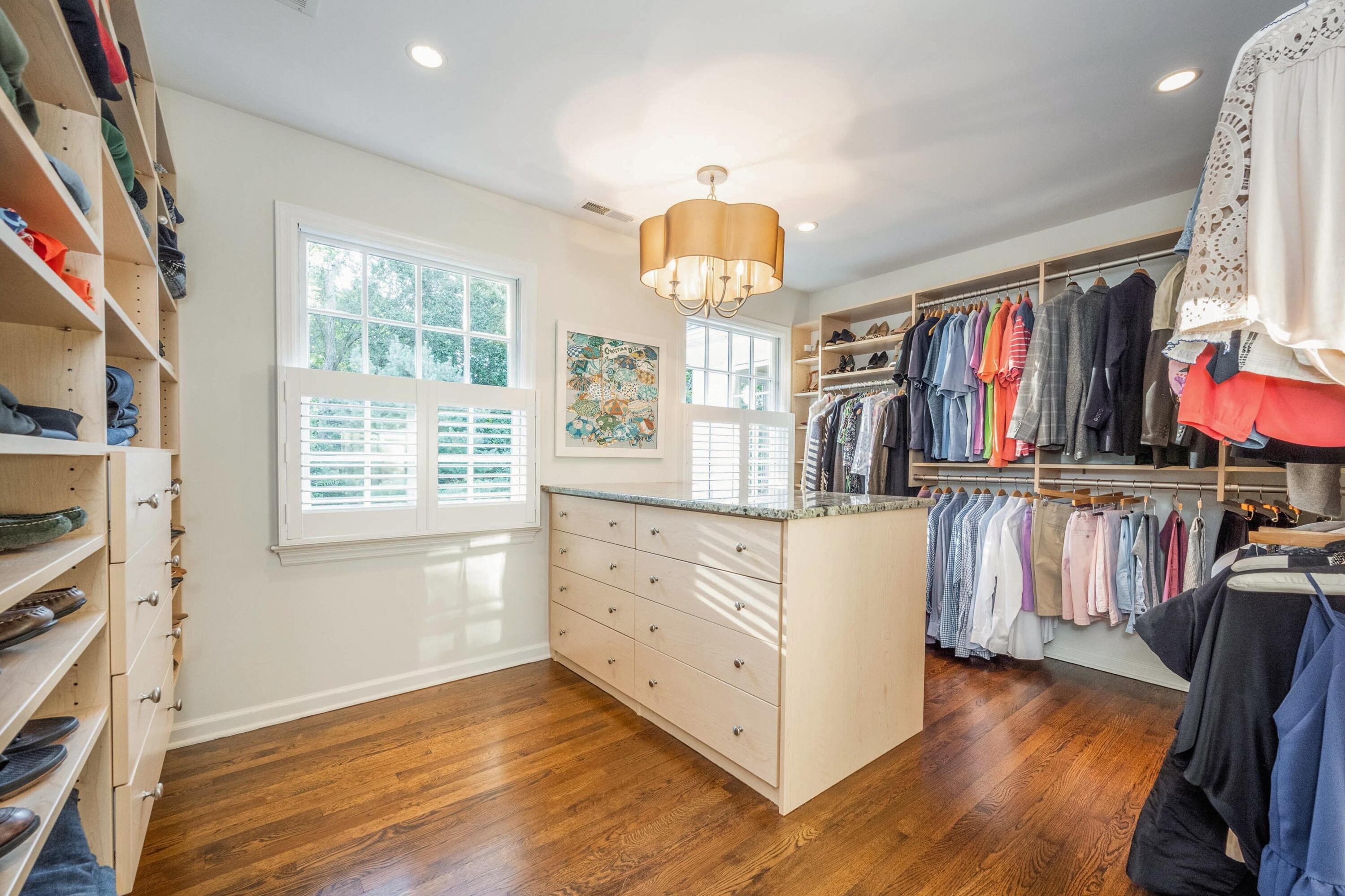 41 Delafield Island Road Darien, CT 06820 - Photo 16 of 30 a view of walk in closet with clothes and shoes