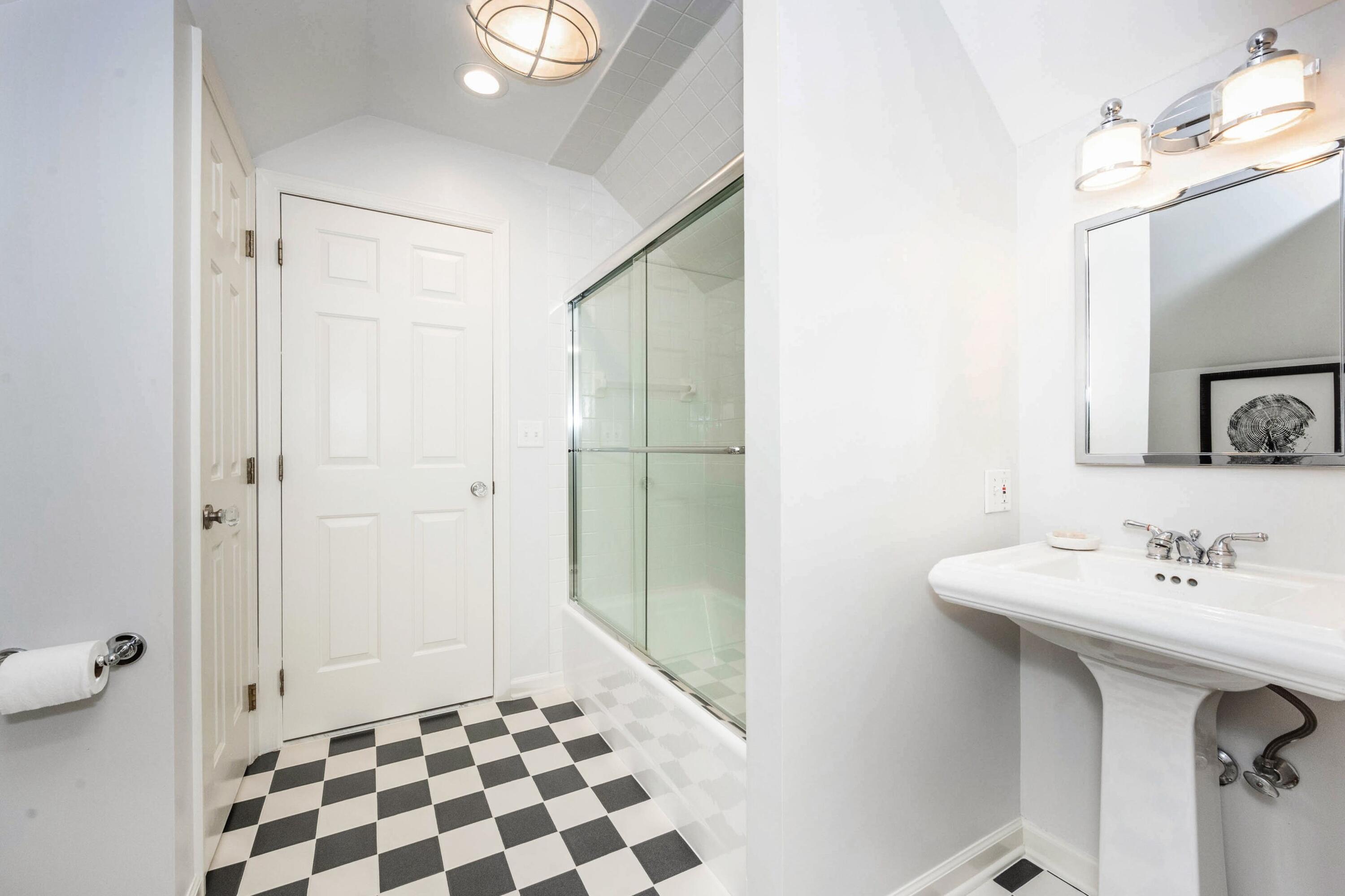 41 Delafield Island Road Darien, CT 06820 - Photo 24 of 30 a bathroom with a sink and a mirror