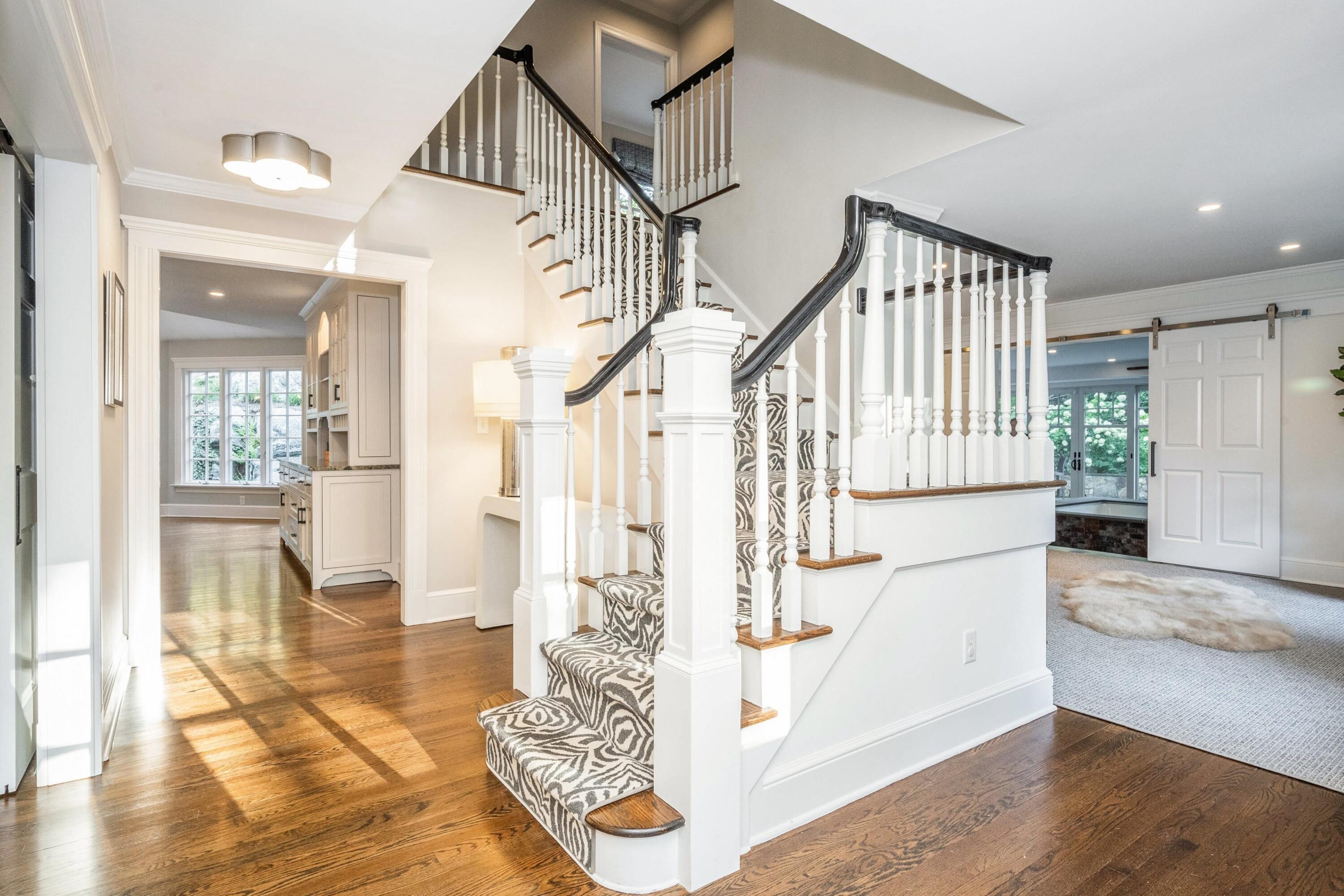 41 Delafield Island Road Darien, CT 06820 - Photo 4 of 30 a view of entryway and hall with wooden floor