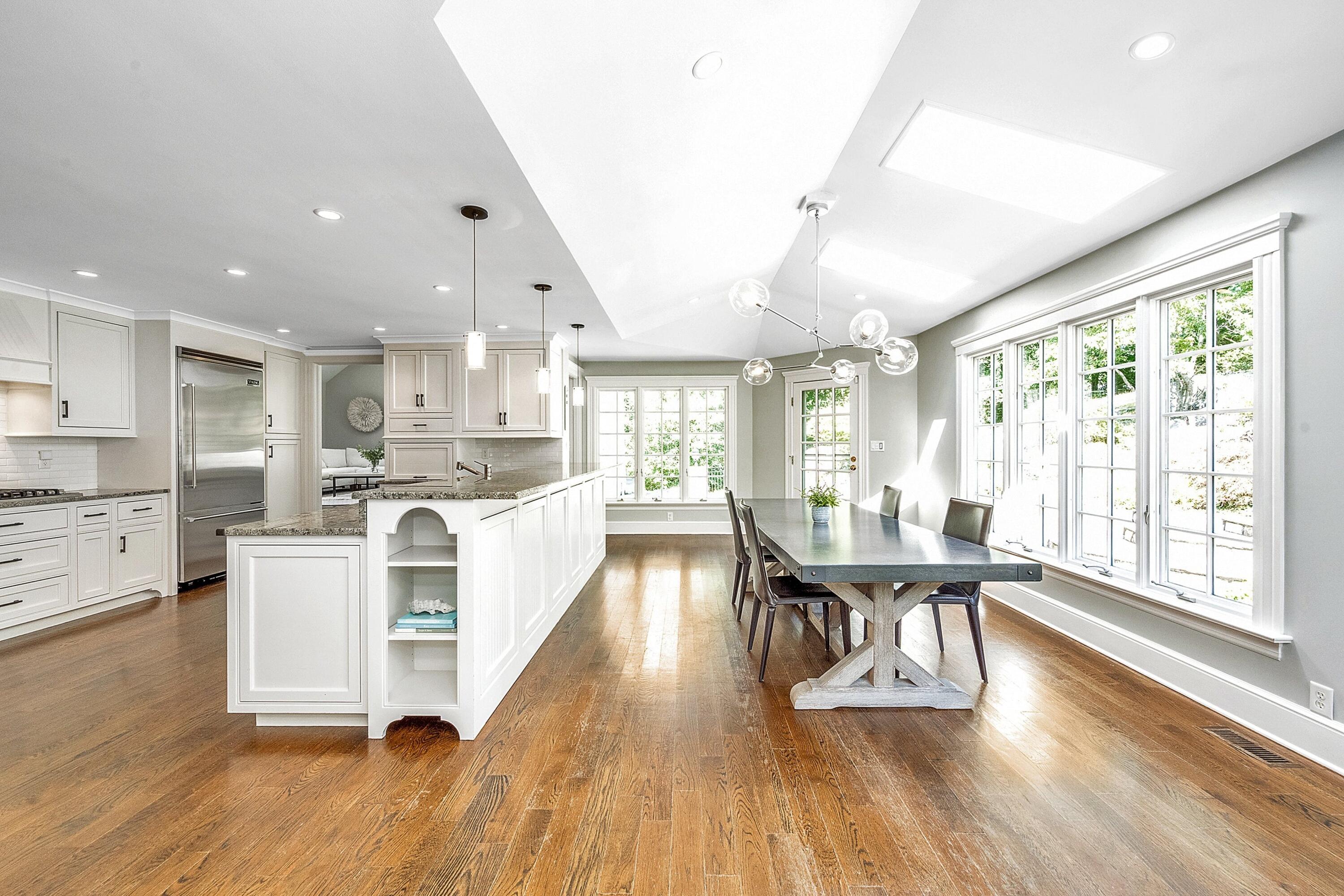 41 Delafield Island Road Darien, CT 06820 - Photo 7 of 30 a living room with stainless steel appliances furniture wooden floor and a kitchen view