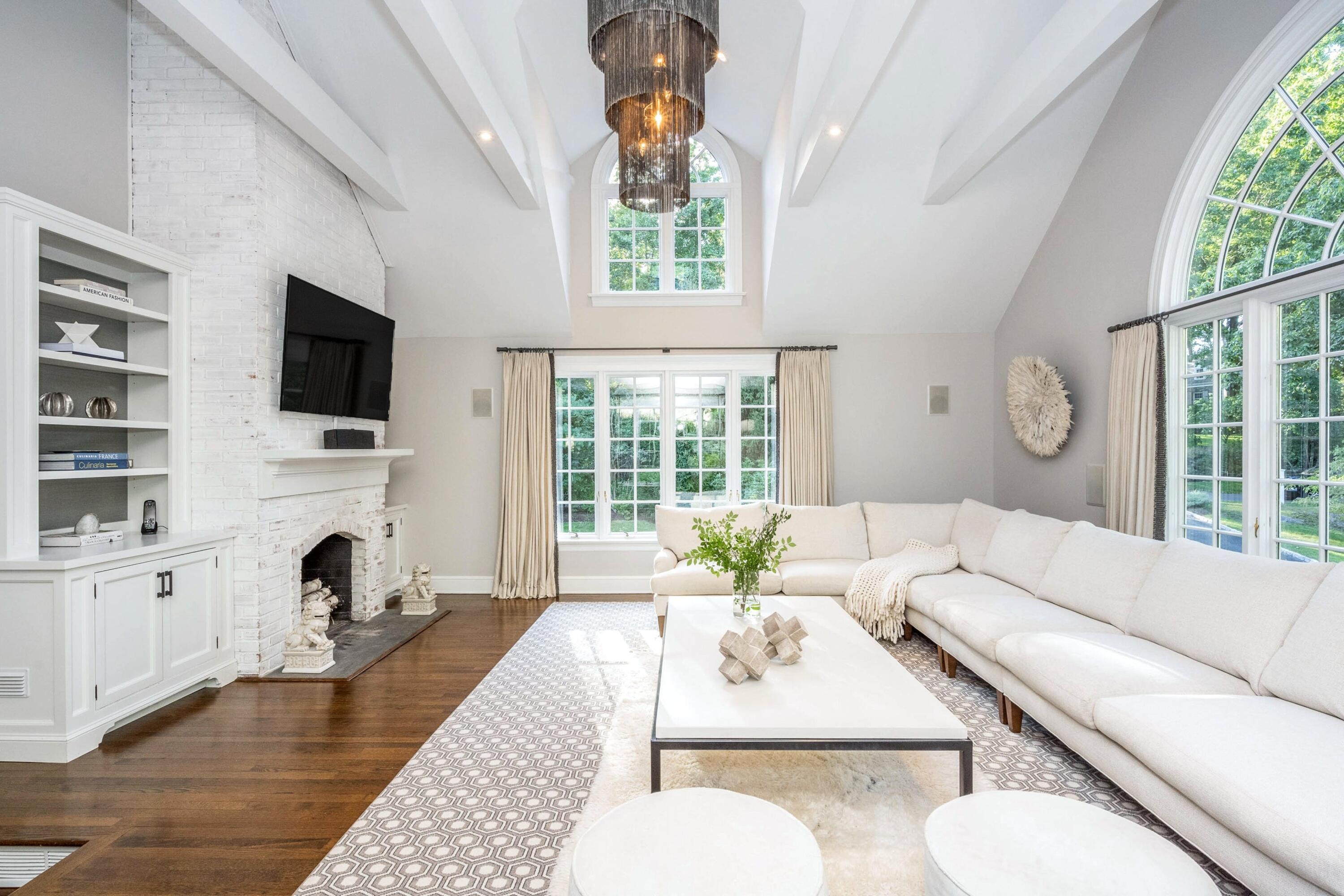 41 Delafield Island Road Darien, CT 06820 - Photo 10 of 30 a living room with fireplace furniture and a flat screen tv
