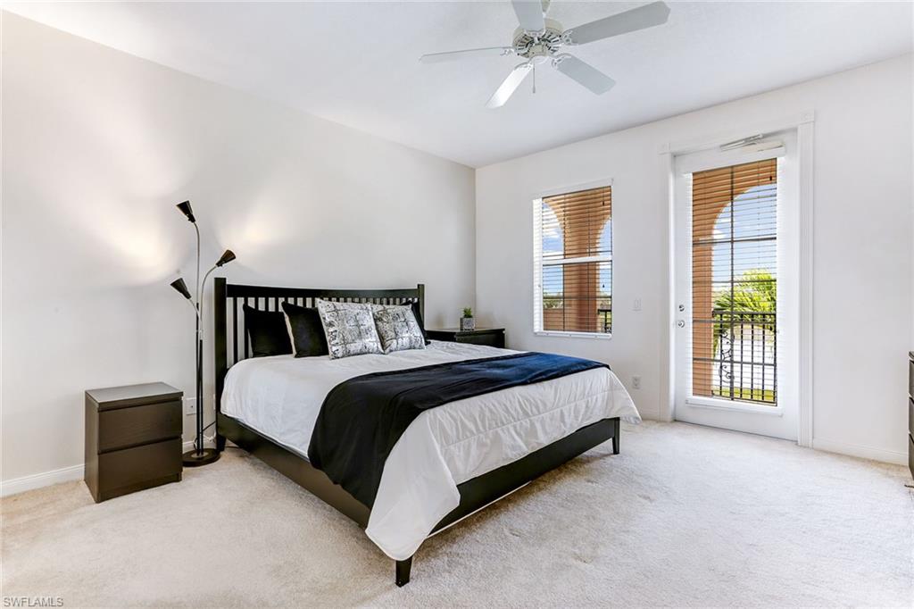 8334 Rimini Way Naples, FL 34114 - Photo 13 of 34 a bedroom with a bed and a window